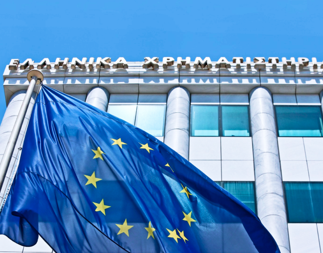 image - the ATHEX building with an EU flag in front of it